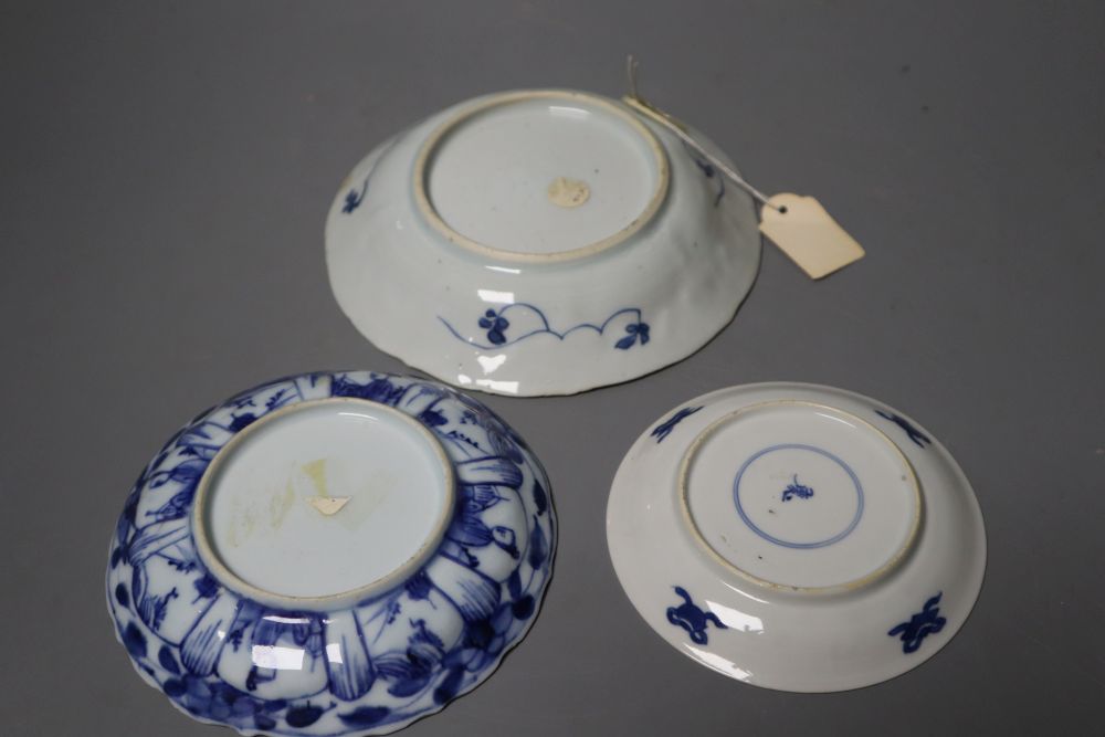 Three Chinese Kangxi blue and white tea bowls and saucers, largest 14cm (6)